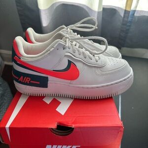 Custom made Nike Air Force One’s. Green and bright orange.